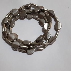 Chico's silver tone small medallion stretch beaded bracelets (3)